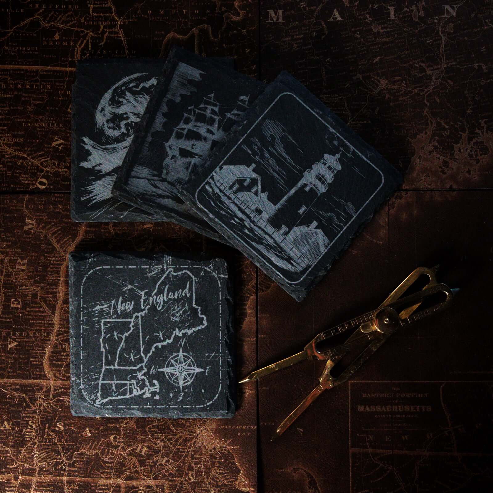 Image depicts a slate coaster with a treasure map of New England on it.